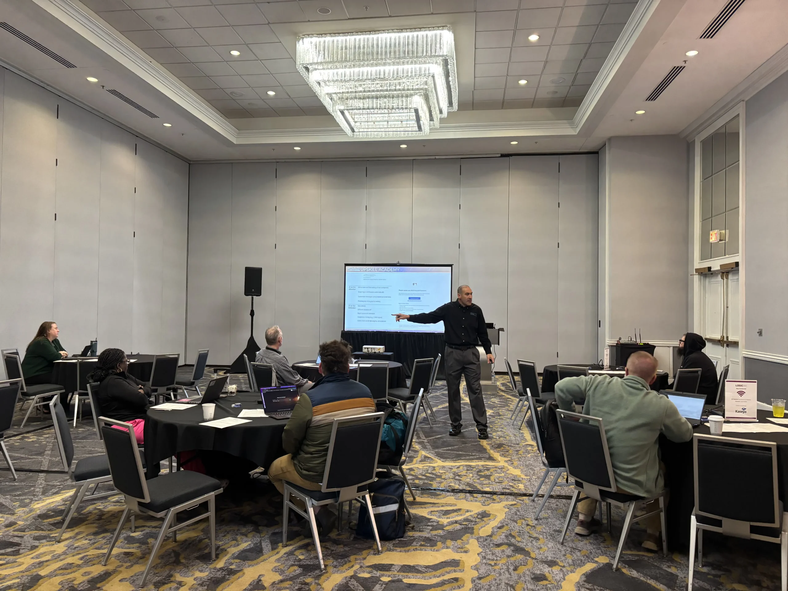 Russ Munisteri teaching cybersecurity at LogicOn 2025